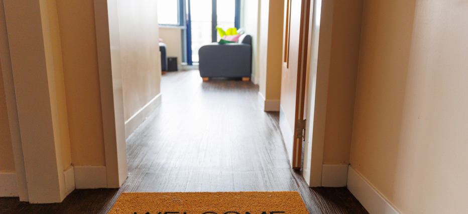 A welcome mat leading into a lounge