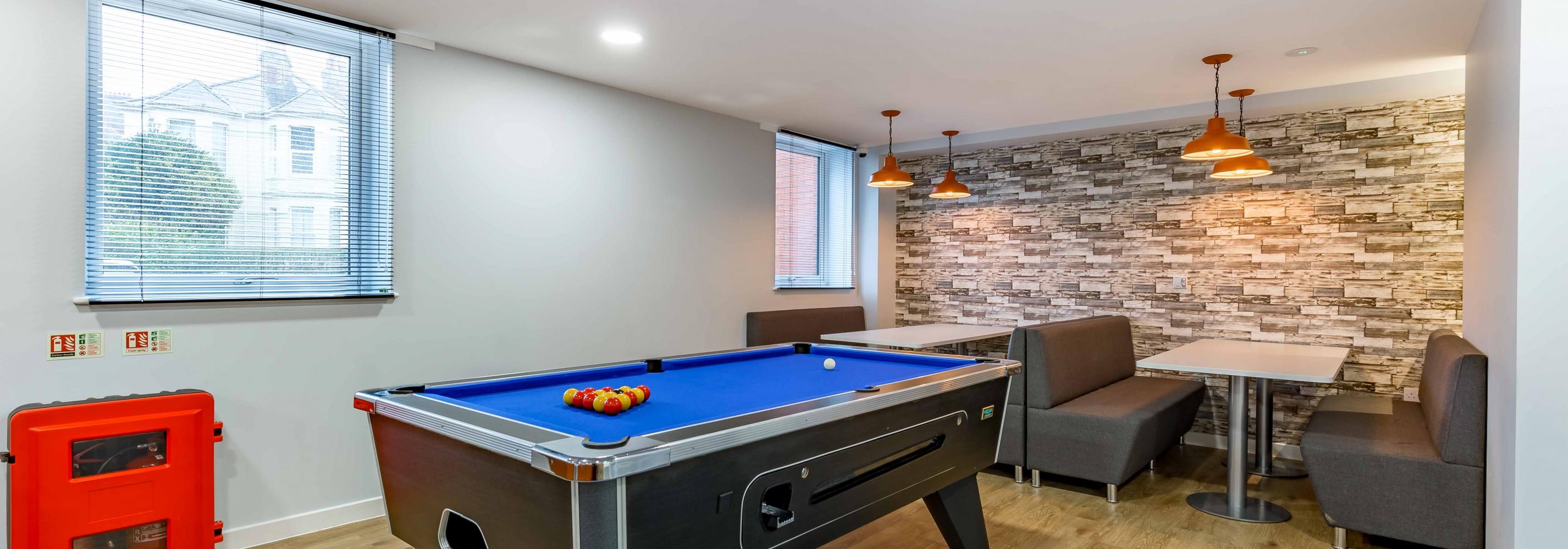 Communal room with pool table 