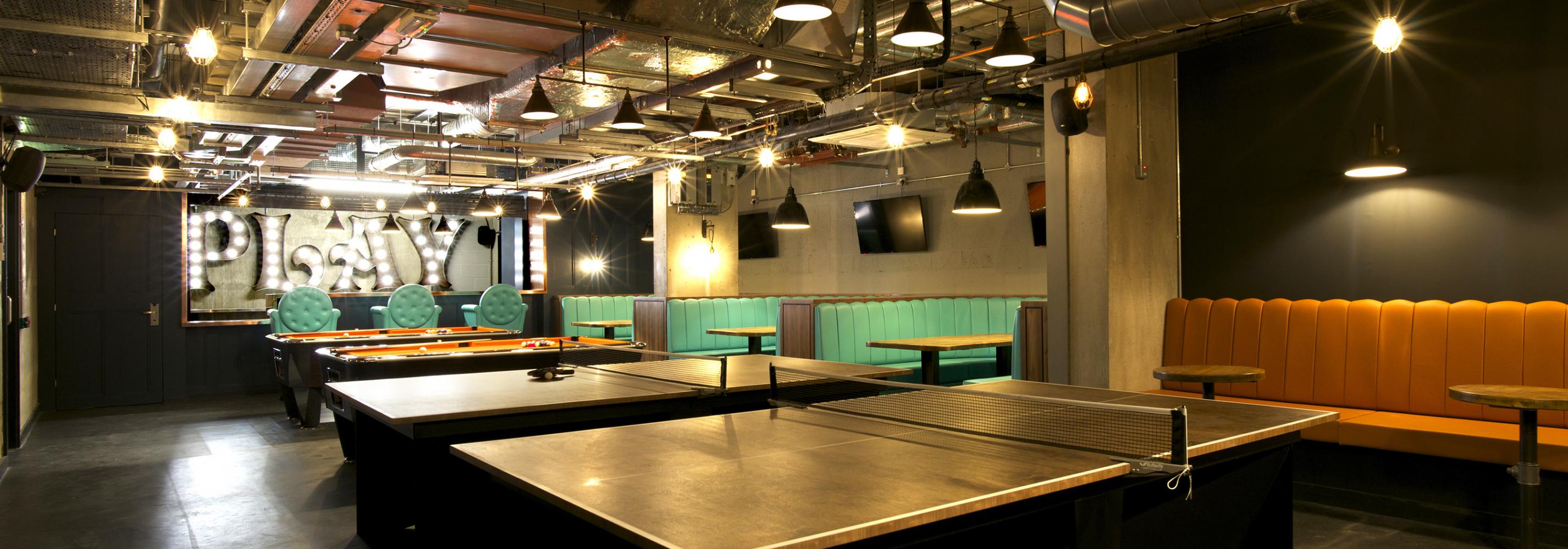 Games room with table tennis and pool tables. 