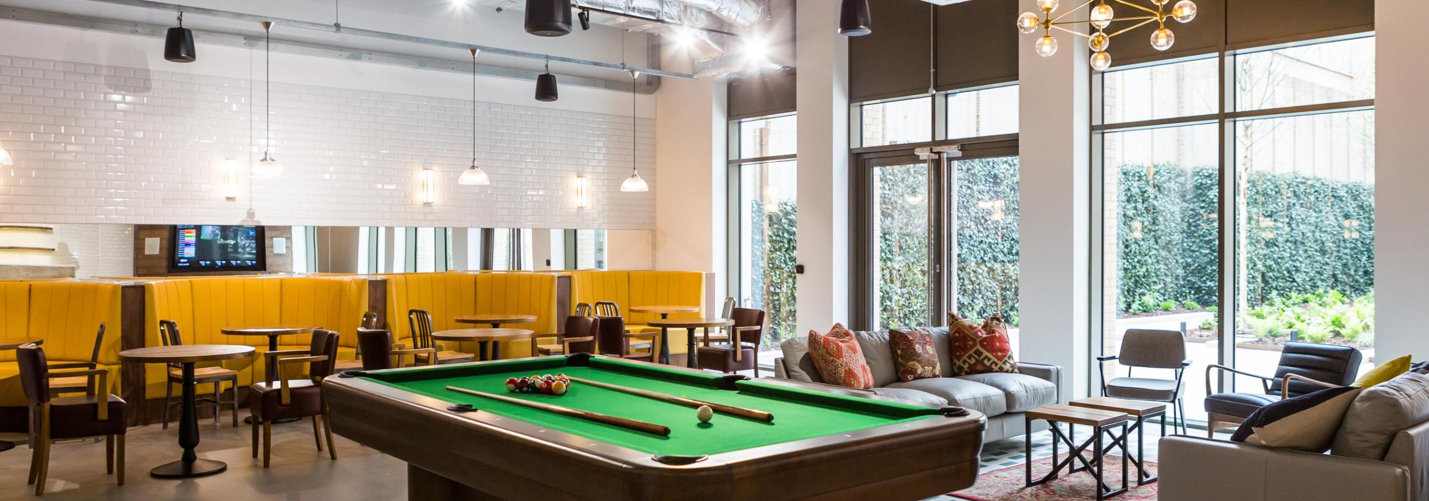 Common Room with pool table and seating