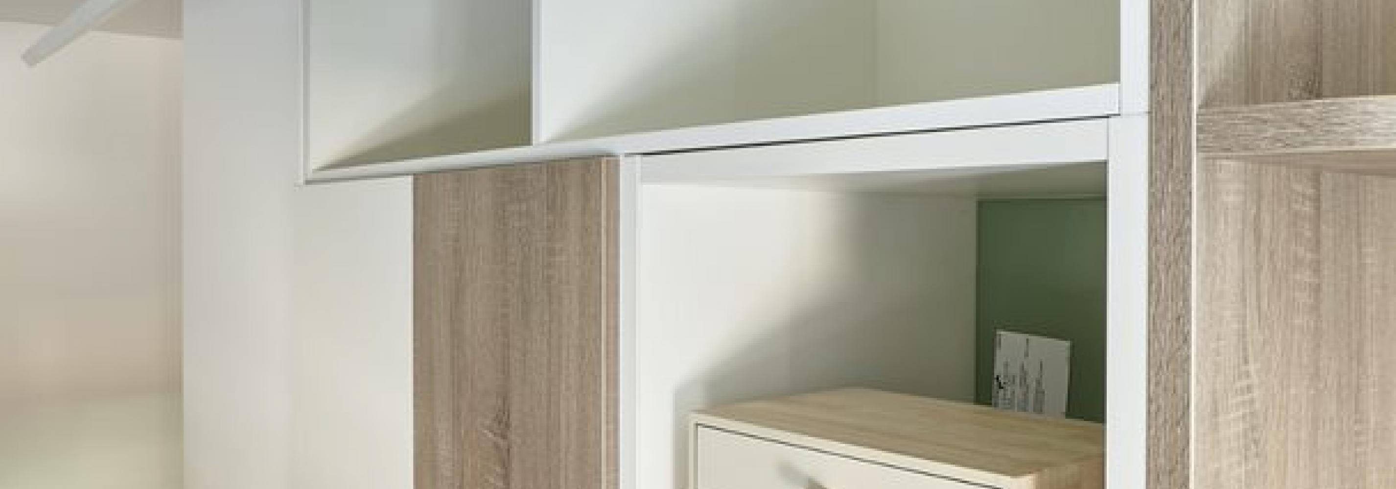 Modern built in storage with wardrove, shelving, drawers and cupboards.