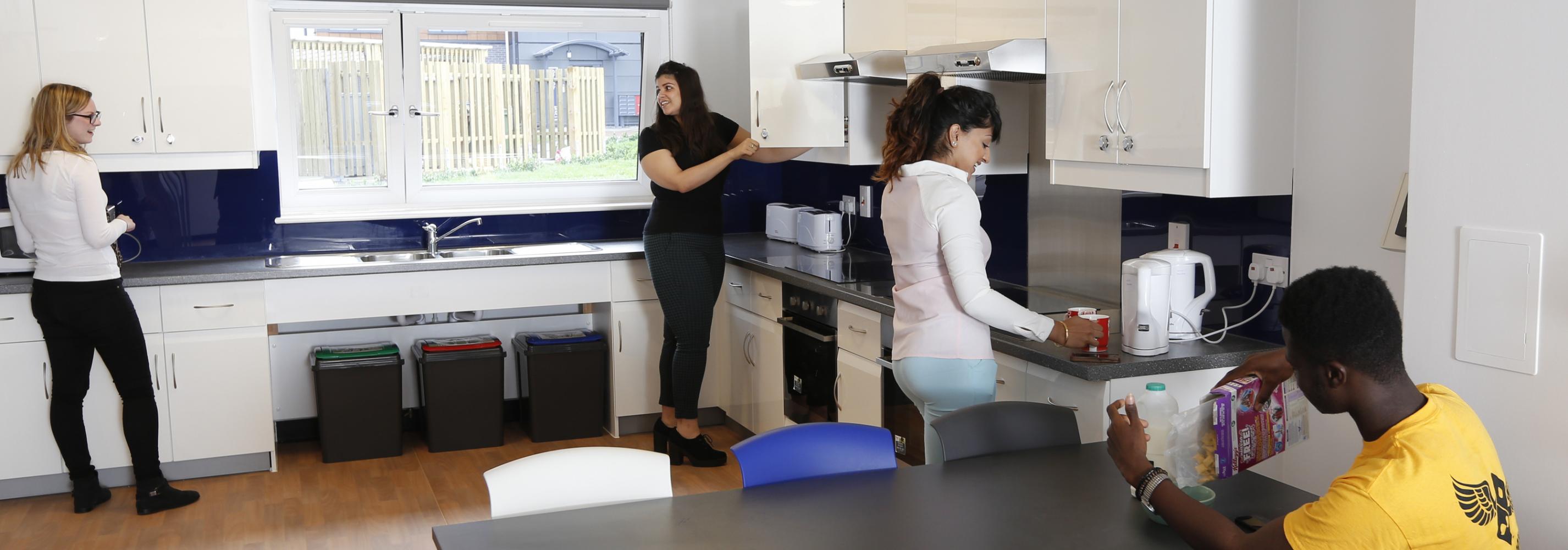 Students in a kitchen on College Lane campus