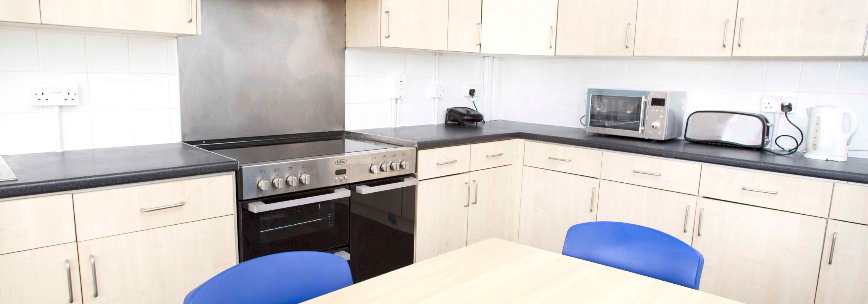 Shared kitchen and living space.