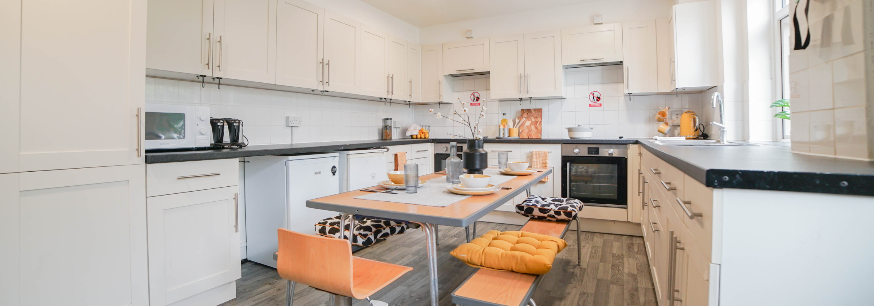 Shared kitchen and living space.