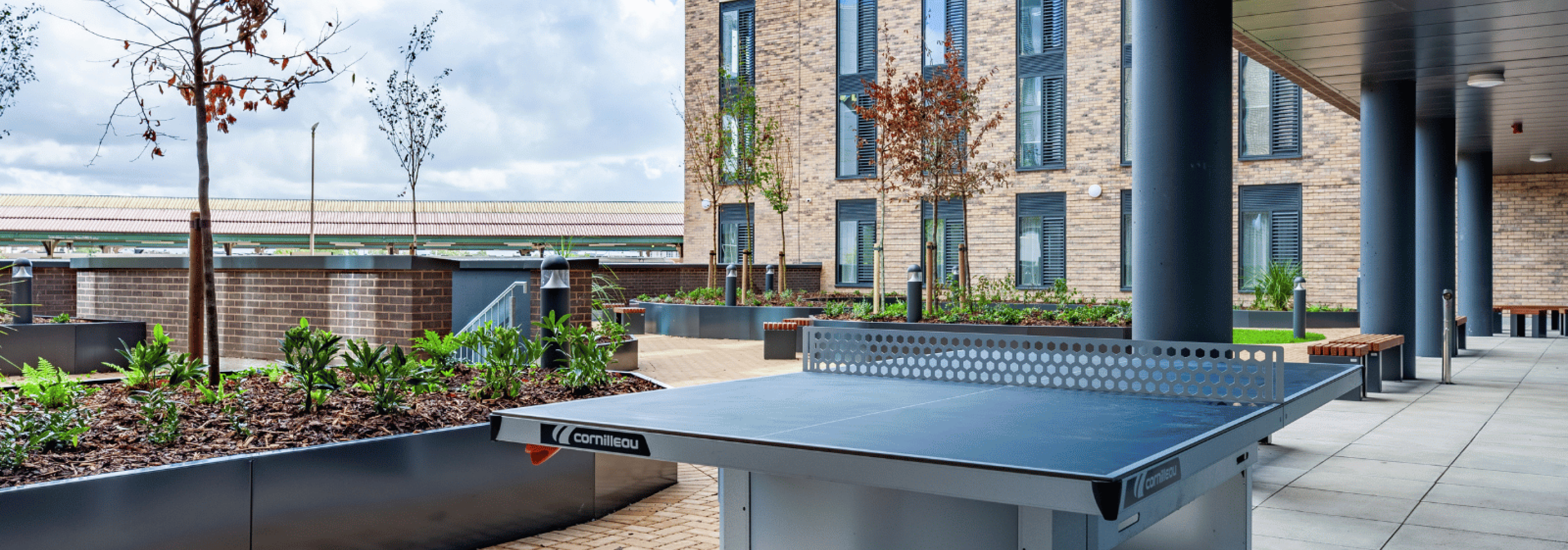 Outdoor courtyard with table tennis table